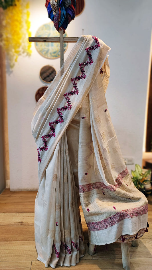 Cream Linen Silk Saree With Hand Embroidery and Zigzag Floral Pallu