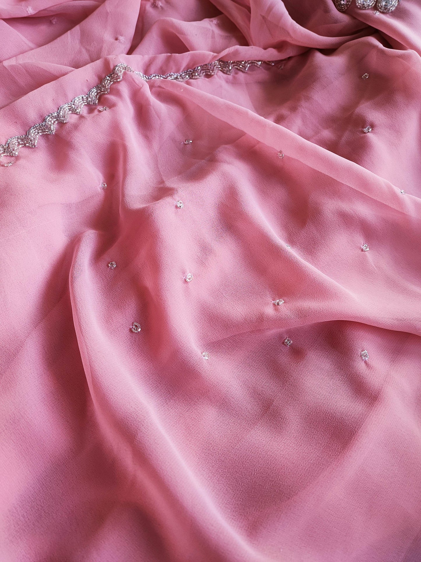 Peach Pink Semi Georgette Saree With Handwork Border & Blouse