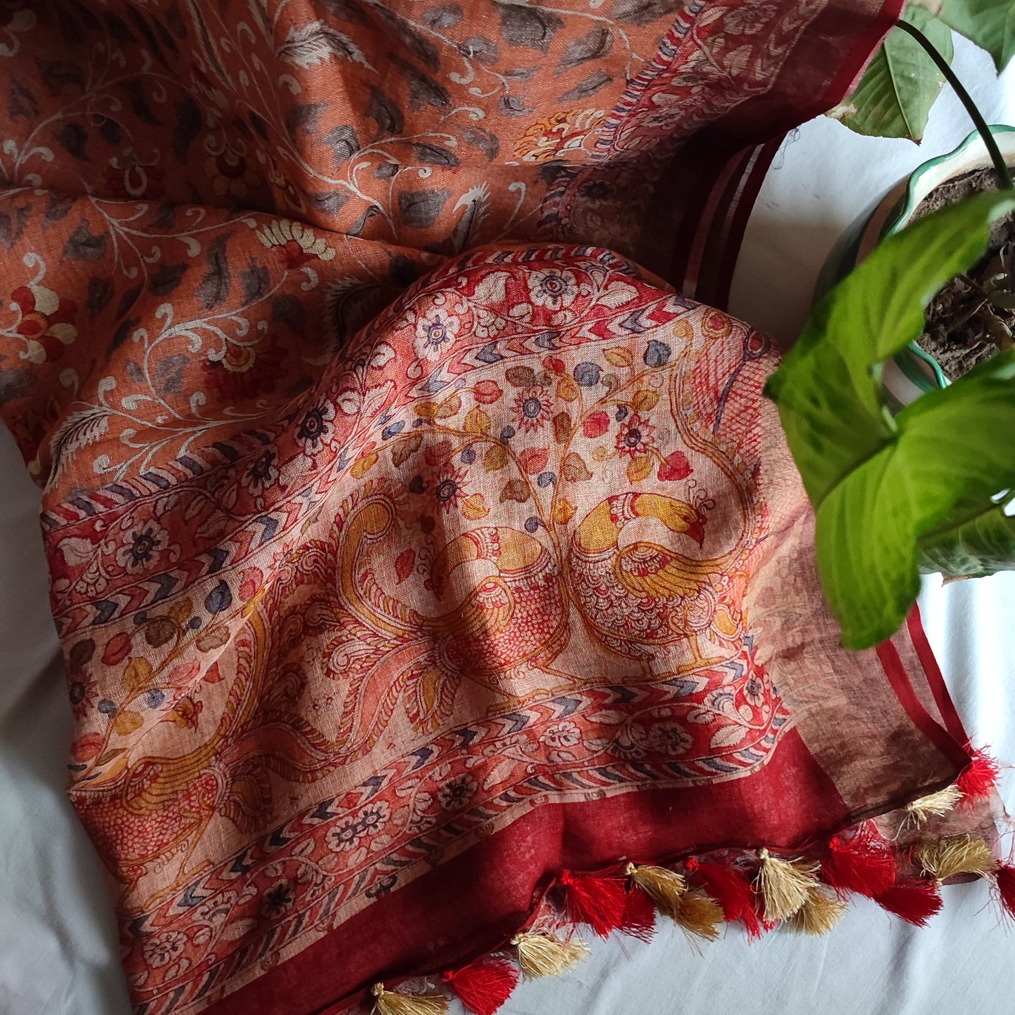 Peach Coral Pure Linen Floral Printed Saree with Tassels Detailing