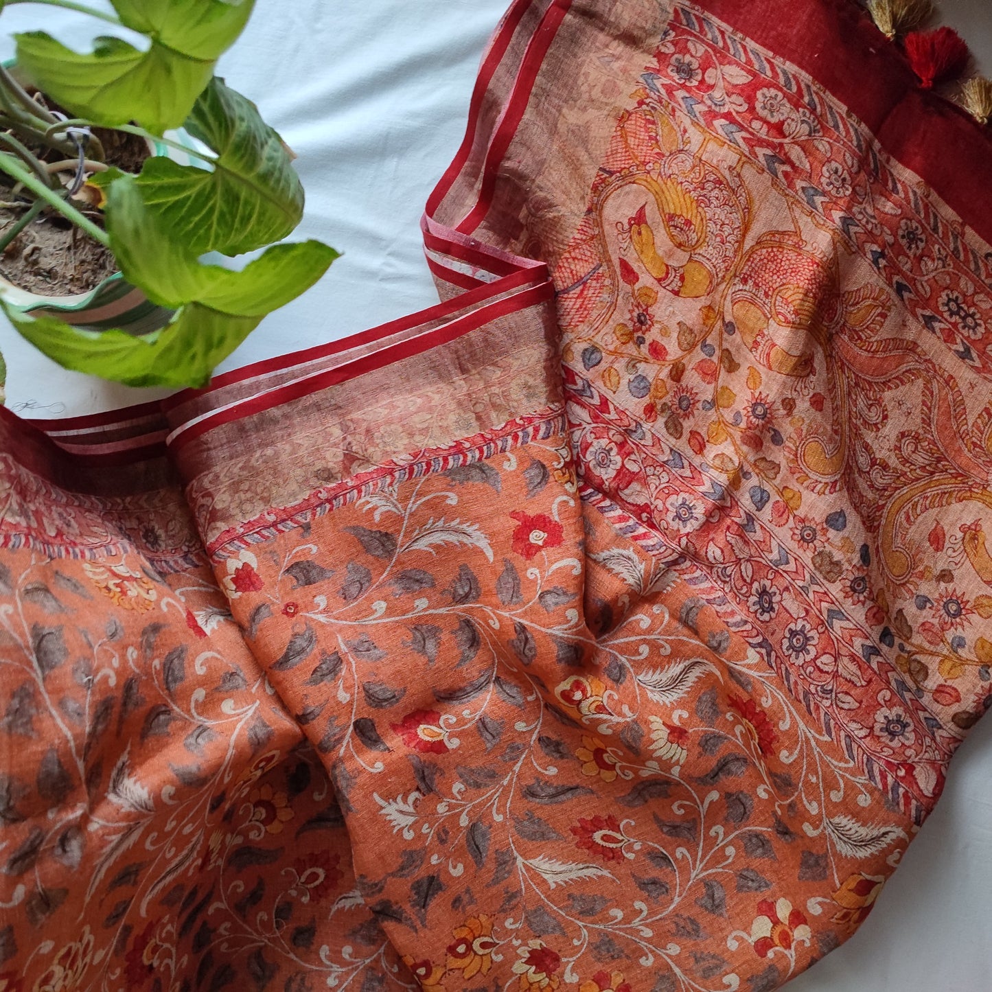 Peach Coral Pure Linen Floral Printed Saree with Tassels Detailing
