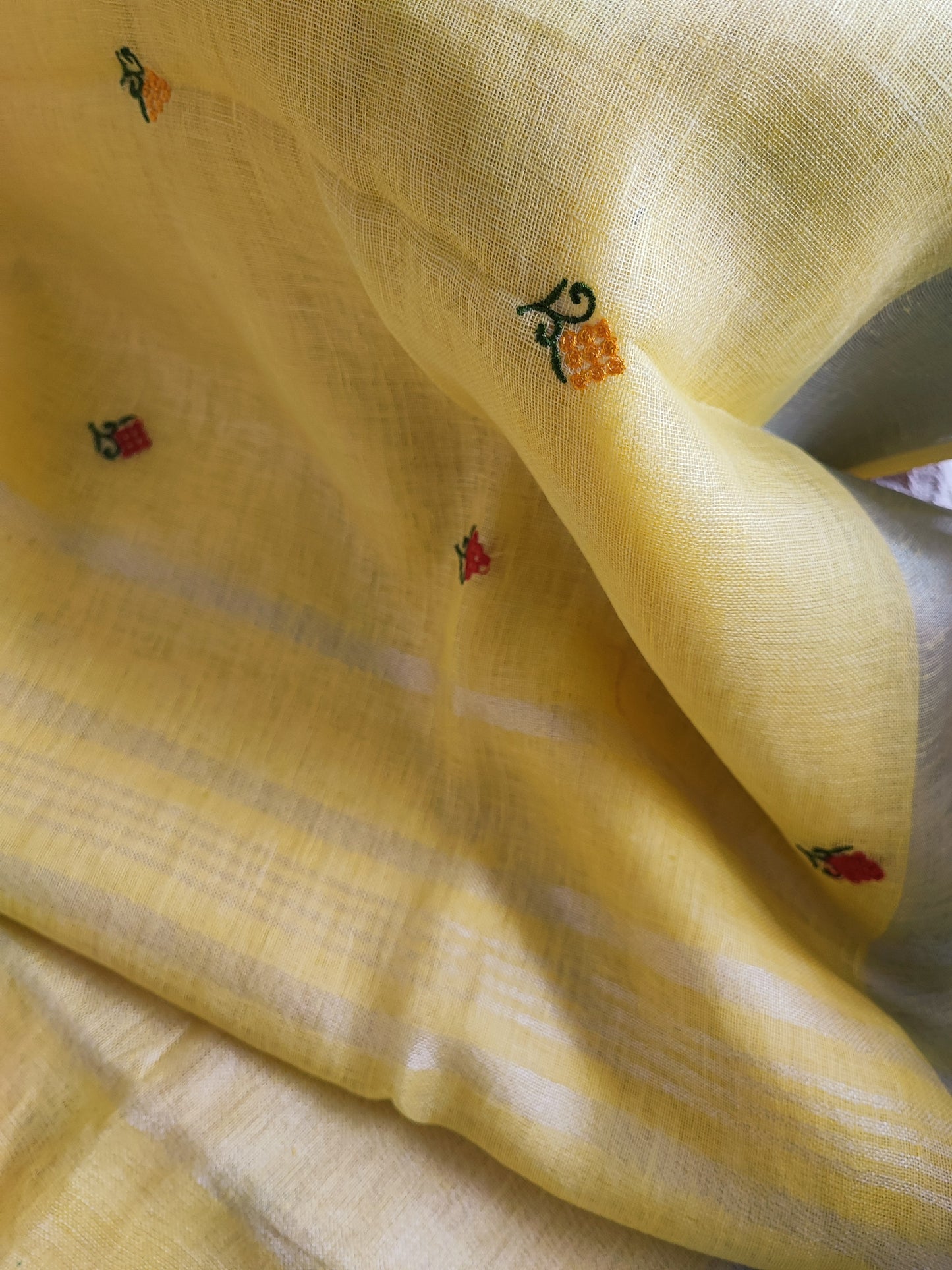 Pastel Yellow Pure Linen Embroidered Saree with Tassels Detailing