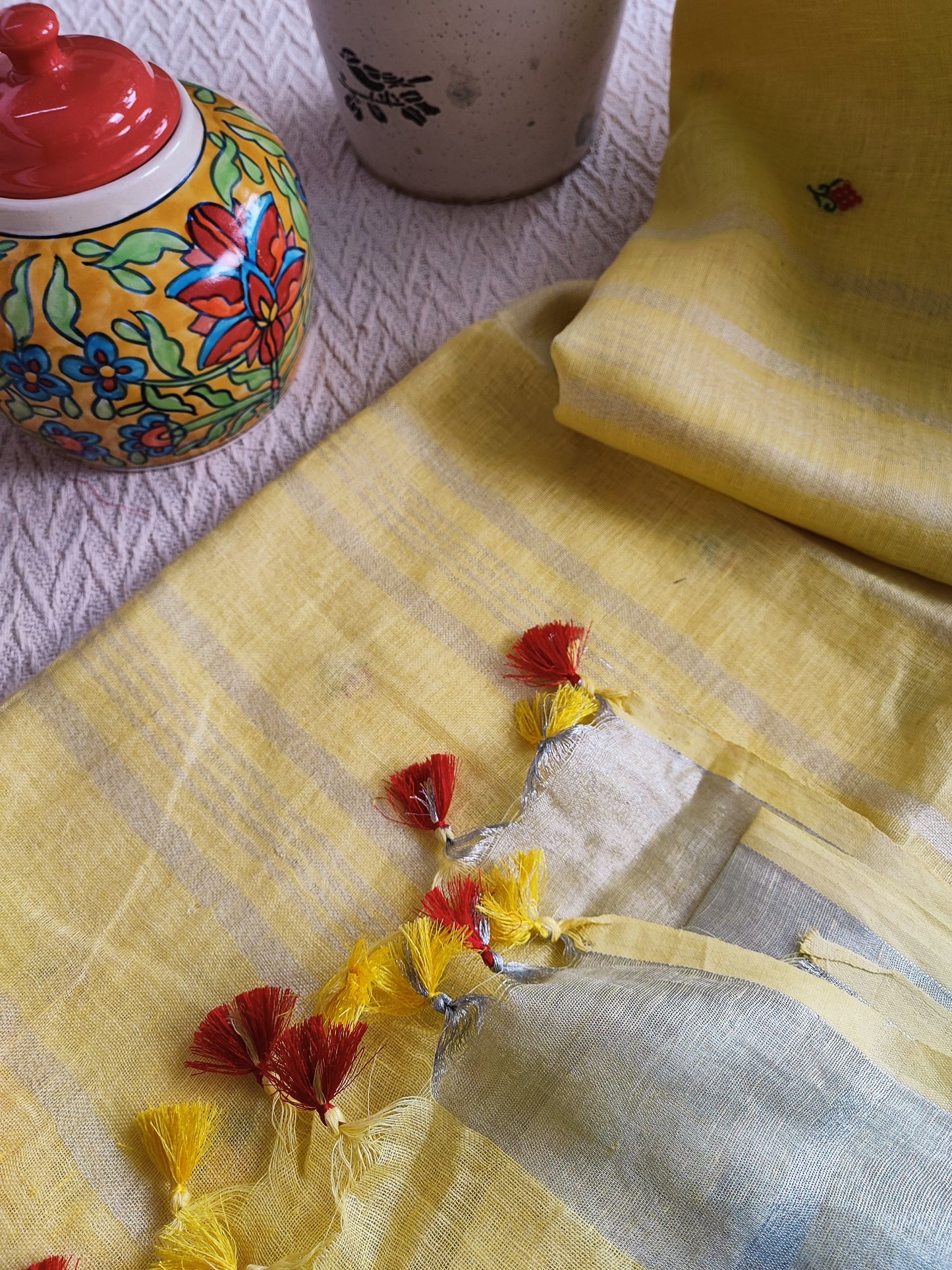 Pastel Yellow Pure Linen Embroidered Saree with Tassels Detailing