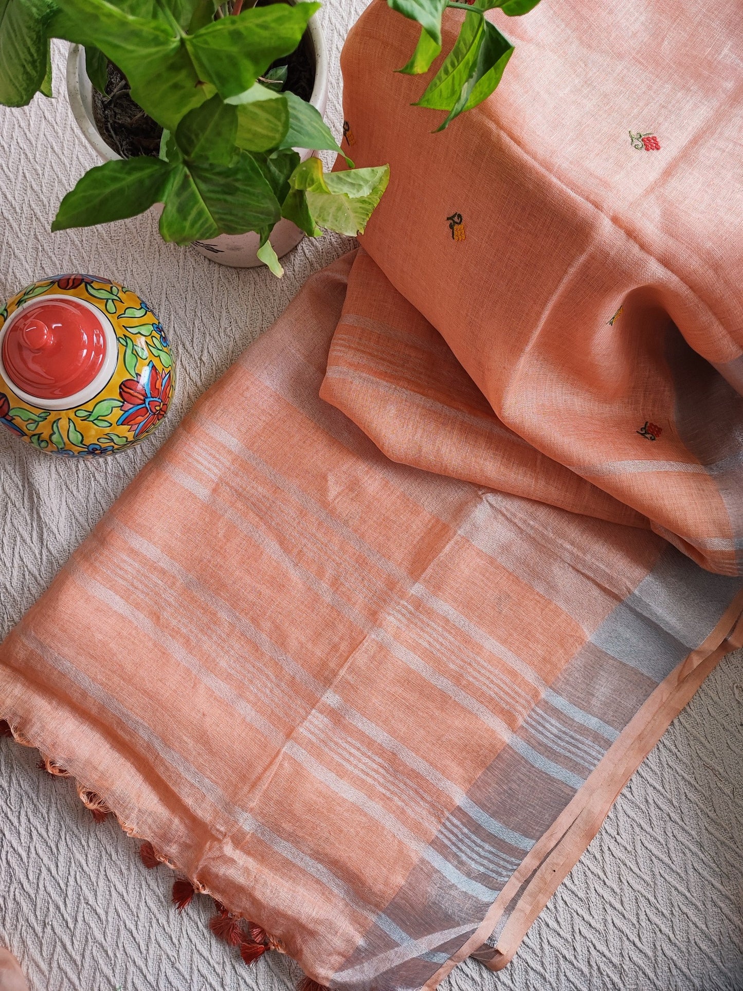 Peach & Silver Linen Embroidered Saree with Tassels Detailing