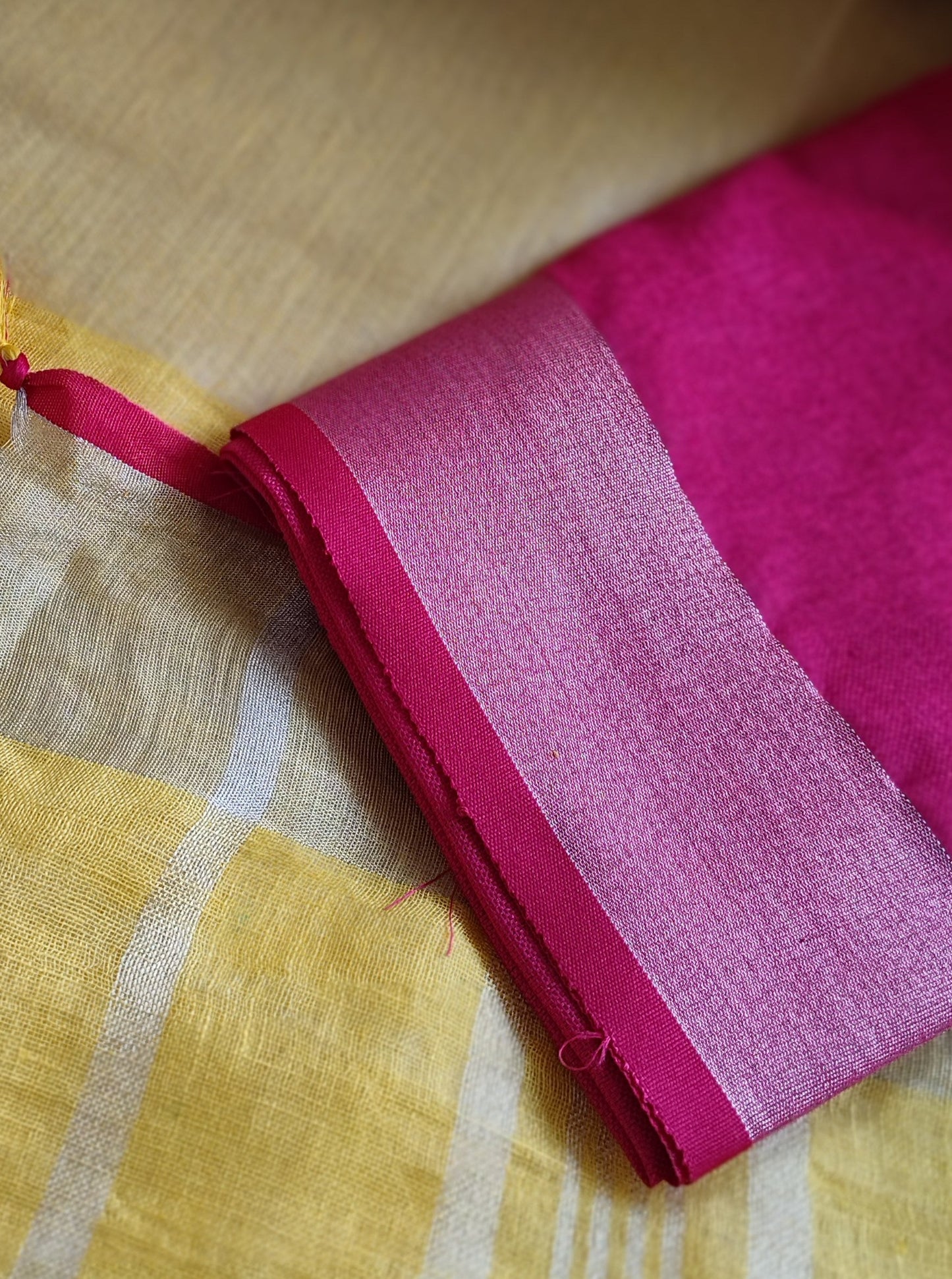 Lemon Yellow Pure Linen Embroidered Saree with Tassels Detailing and Hot Pink Blouse