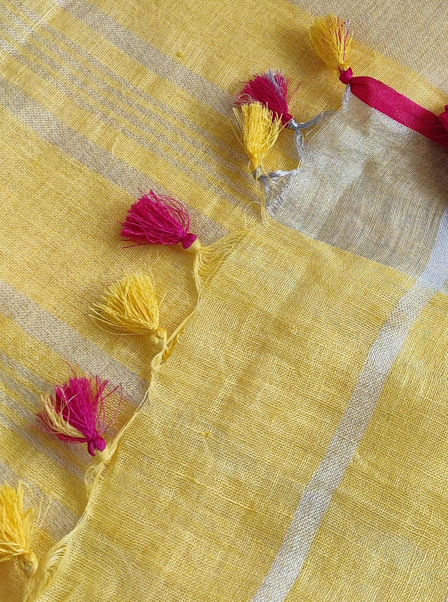 Lemon Yellow Pure Linen Embroidered Saree with Tassels Detailing and Hot Pink Blouse