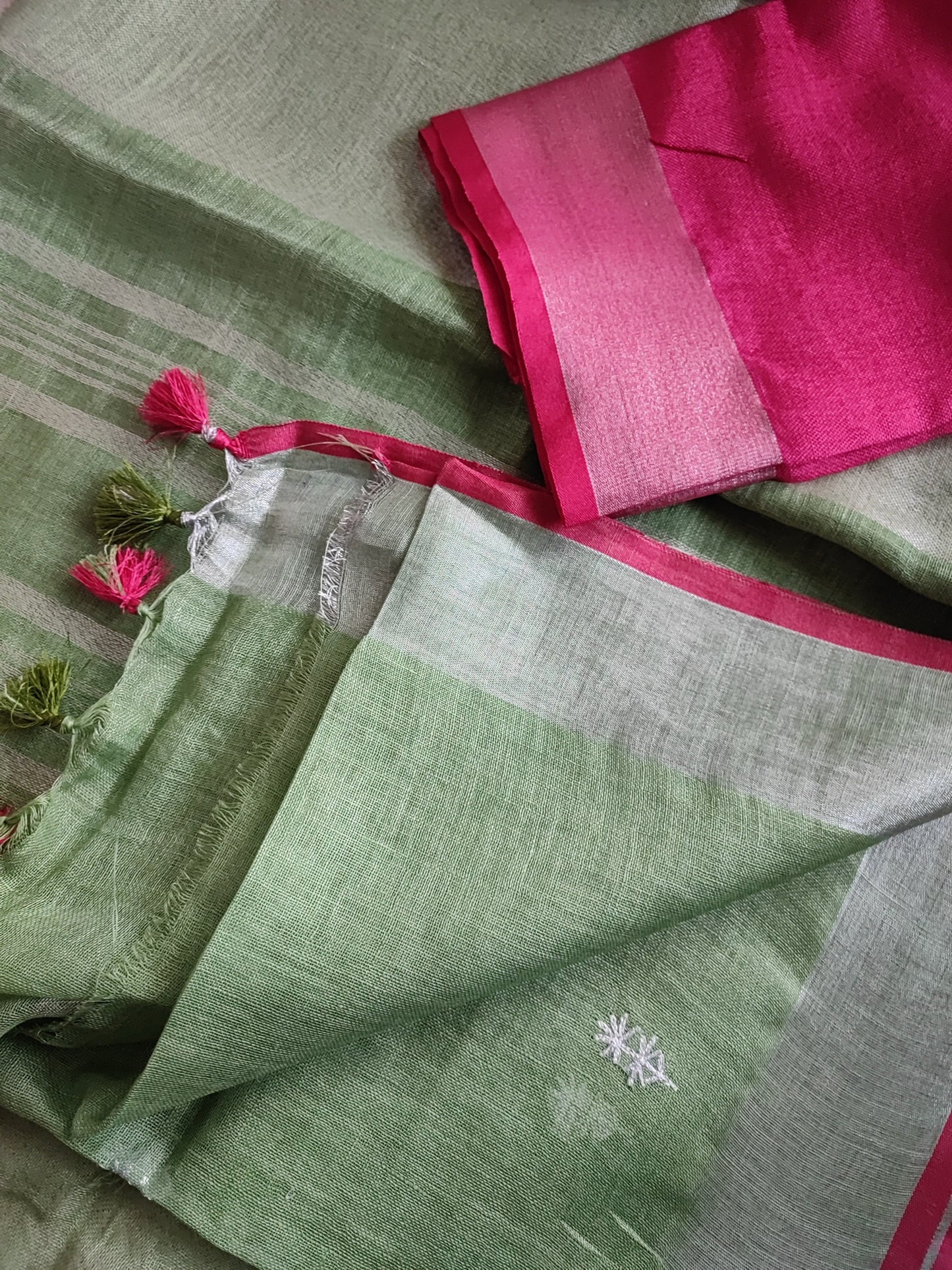 Pastel Green Pure Linen Embroidered Saree with Tassels Detailing and Hot Pink Blouse