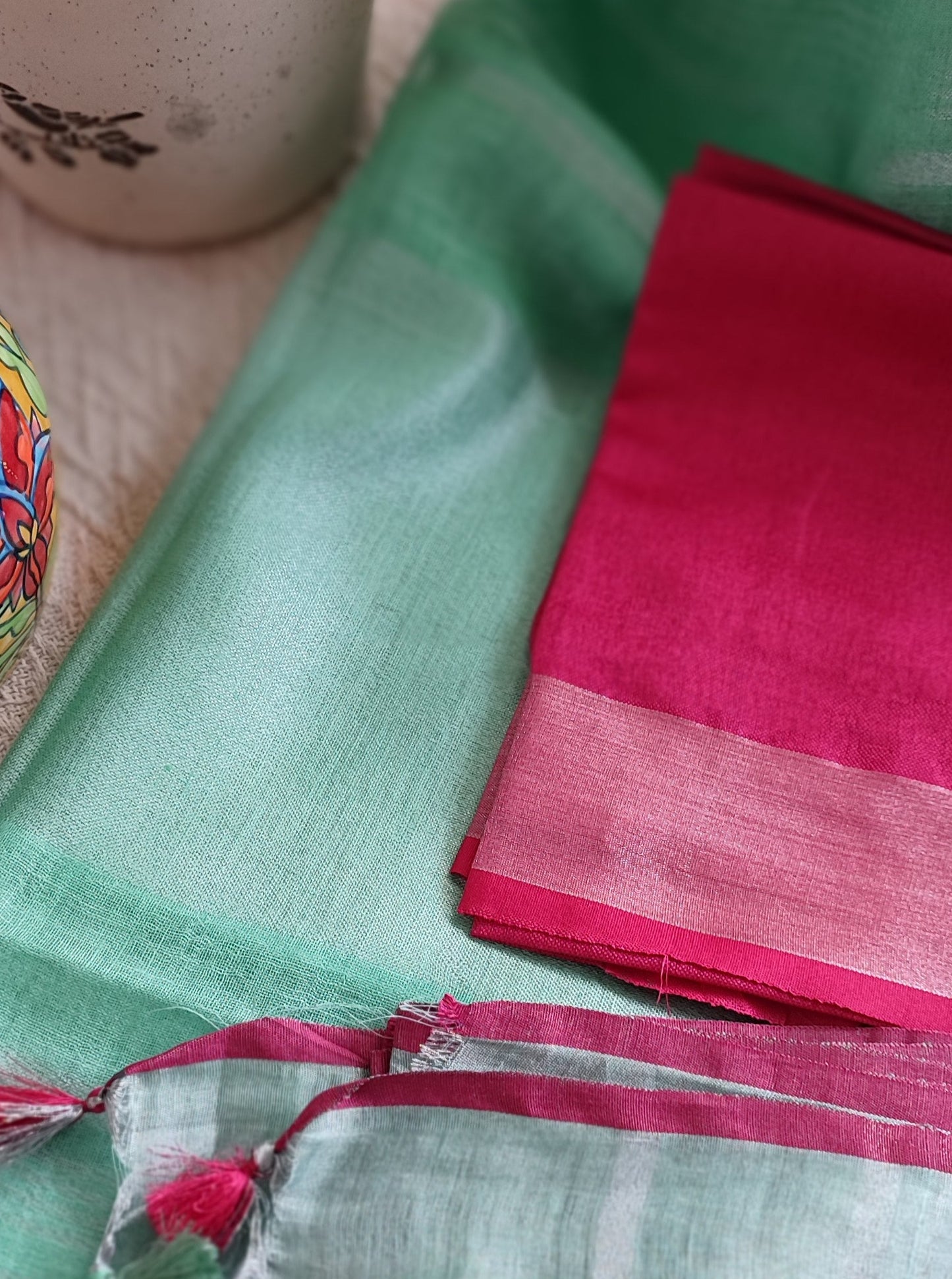 Pale Turquoise Pure Linen Embroidered Saree with Tassels Detailing and Hot Pink Blouse