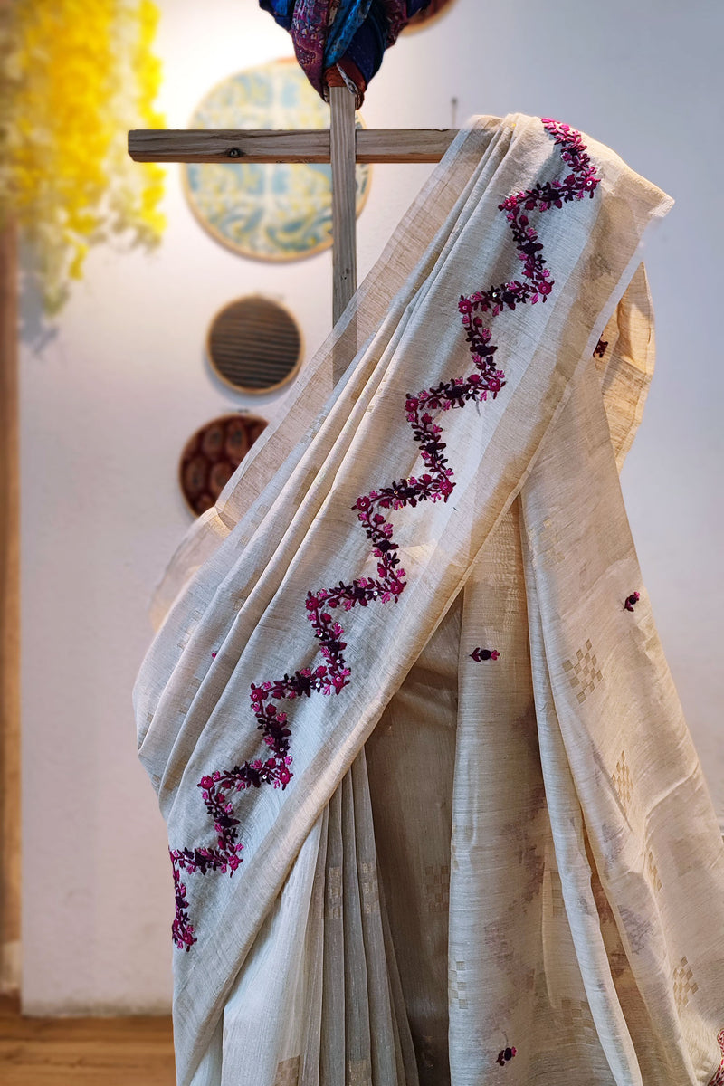Cream Linen Silk Saree With Hand Embroidery and Zigzag Floral Pallu