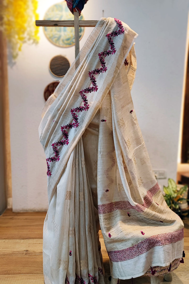Cream Linen Silk Saree With Hand Embroidery and Zigzag Floral Pallu