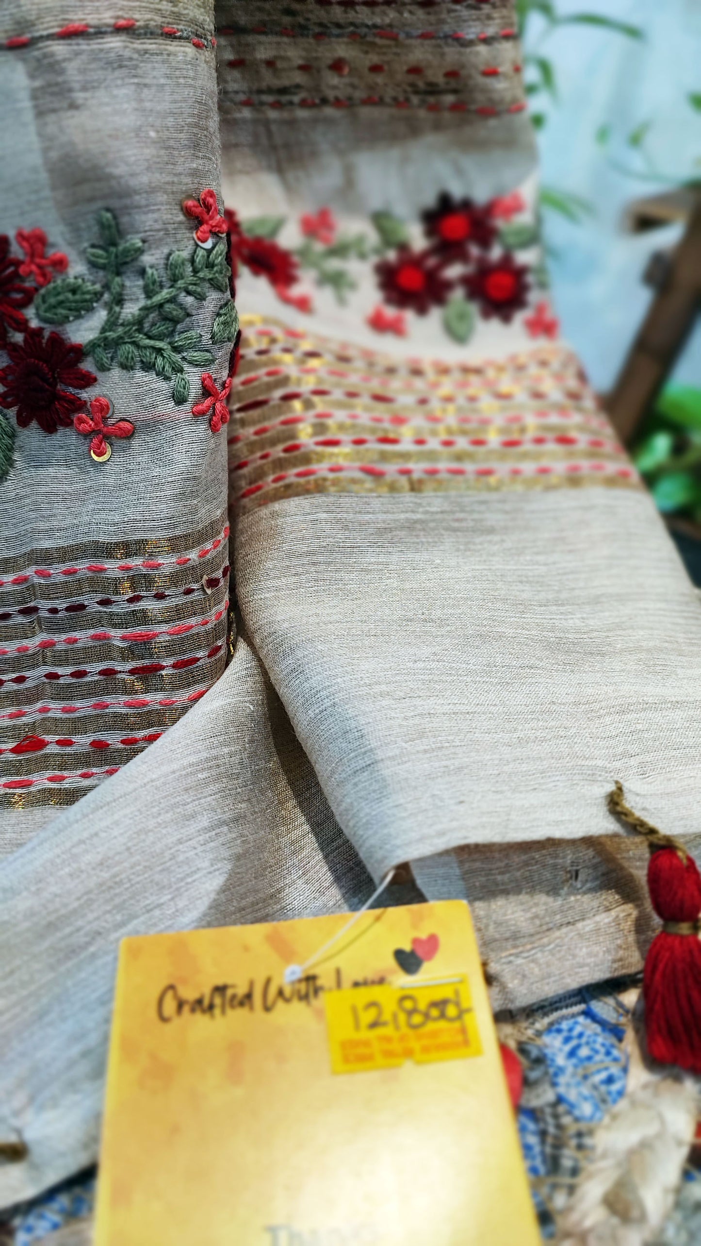 Cream Linen Silk Saree With Hand Embroidery and Floral Pallu