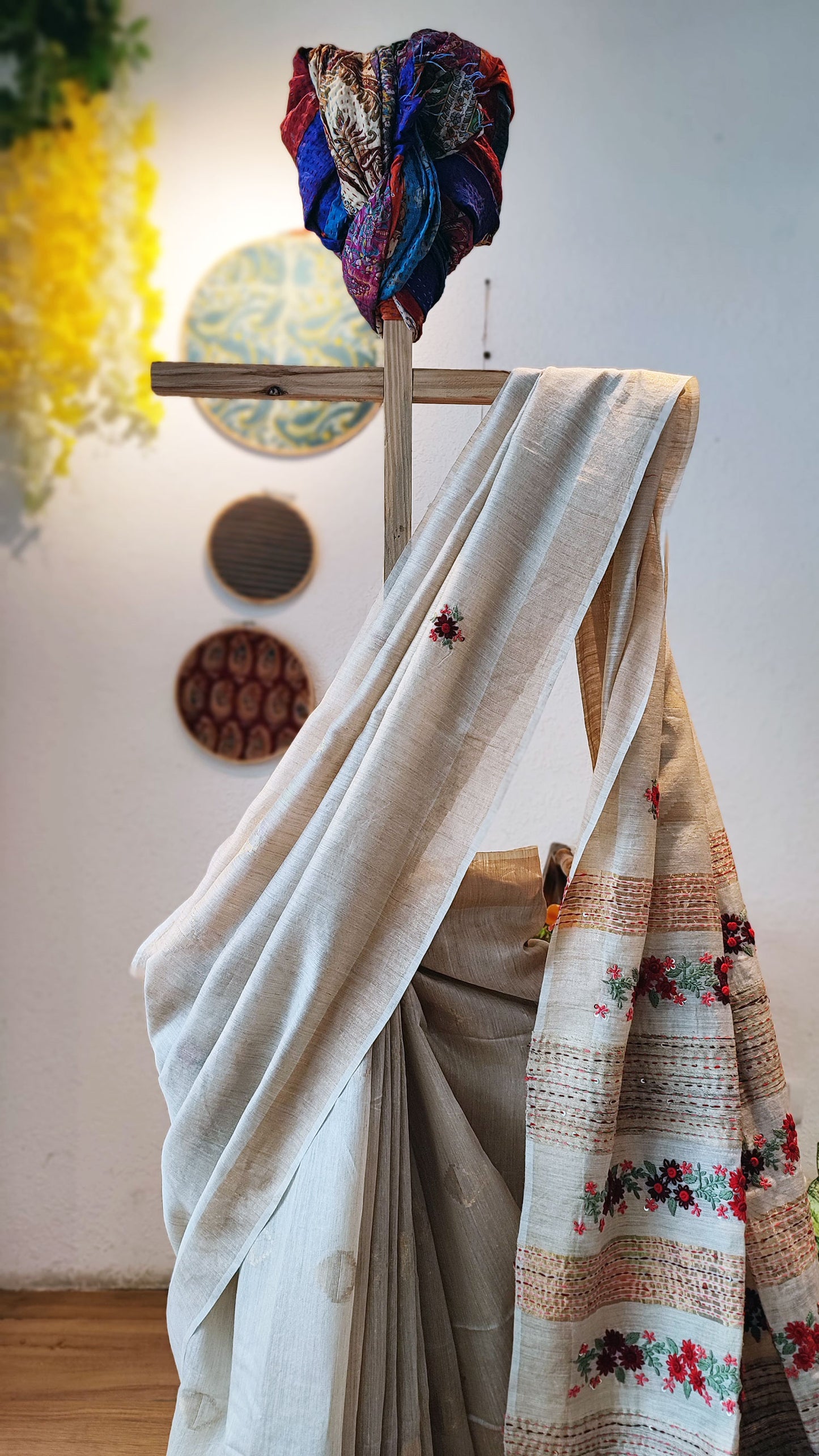 Cream Linen Silk Saree With Hand Embroidery and Floral Pallu