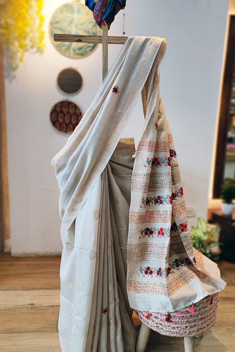 Cream Linen Silk Saree With Hand Embroidery and Floral Pallu