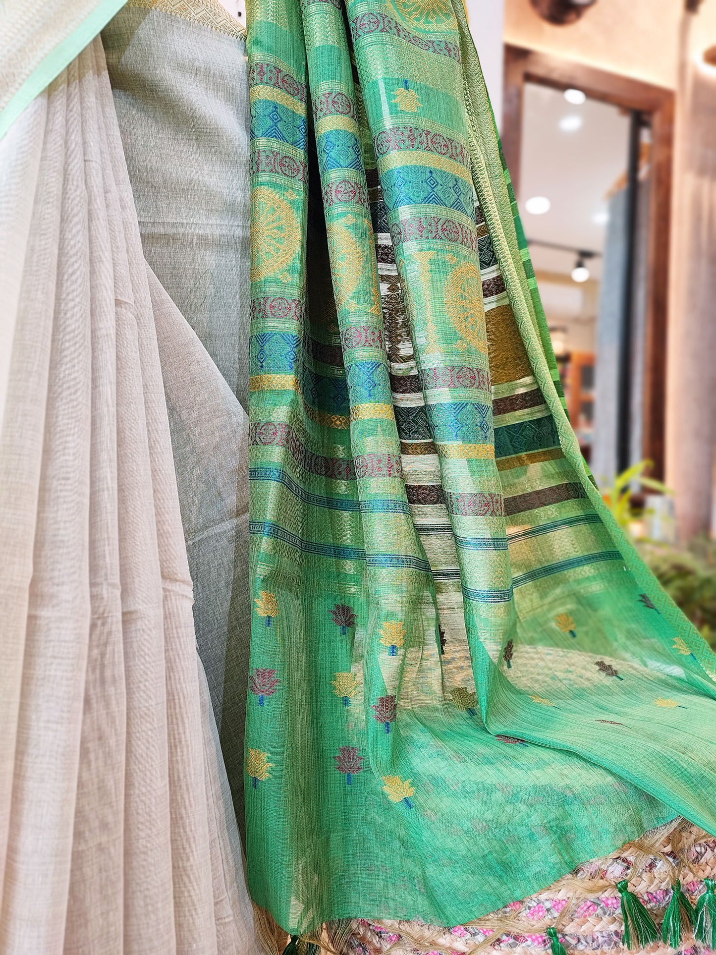 Parchment Cream Jamdani Saree With Rich Ethnic Fern Green Woven Border