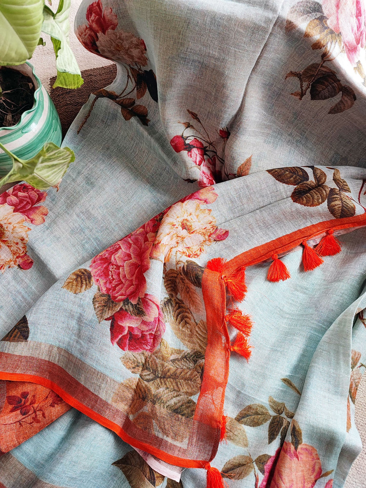 Light Blue & Kesar Floral Printed Saree with Tassels Detailing