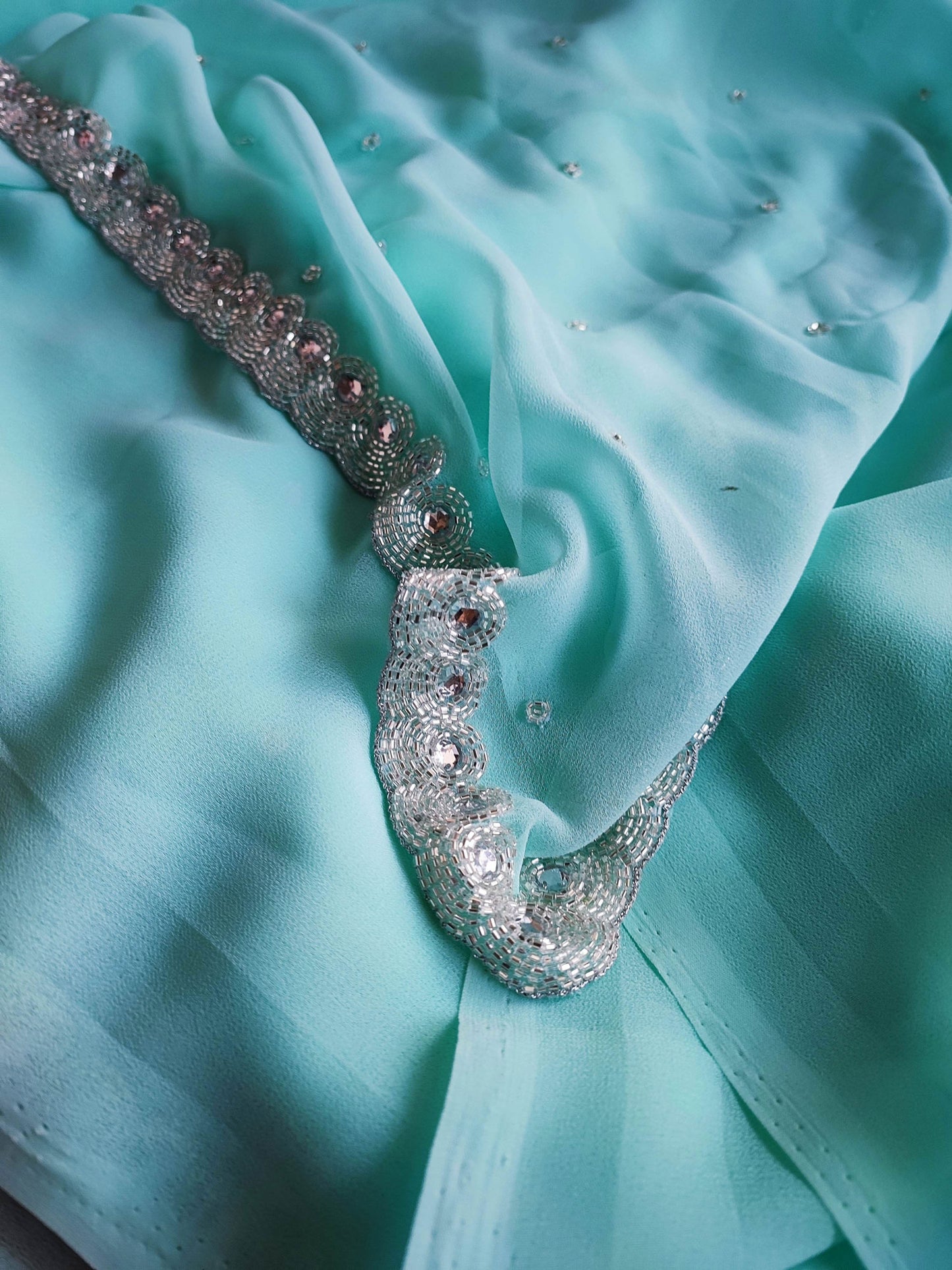 Firozi Semi Georgette Saree With Handwork Border & Blouse