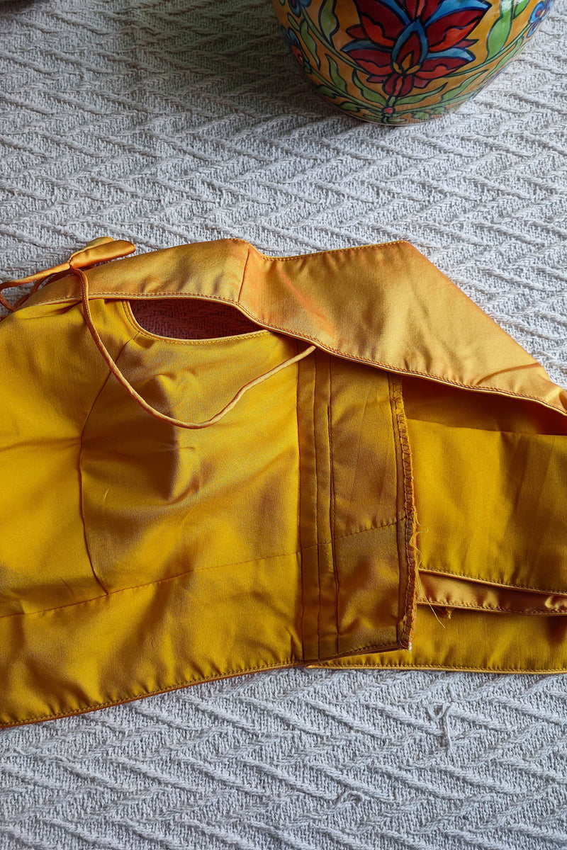 Saffron Yellow Cotton By Silk Padded Sleeveless Blouse with Broad U Neckline (With Attachable Sleeves)