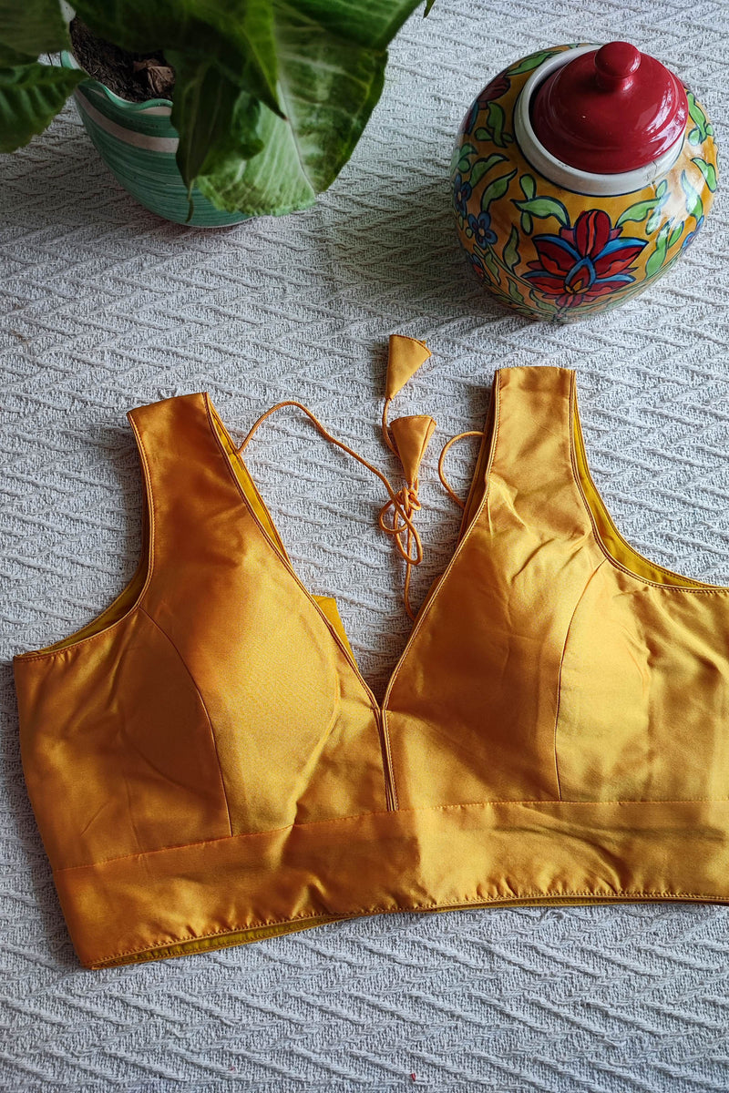 Saffron Yellow Cotton By Silk Padded Sleeveless Blouse with Broad U Neckline (With Attachable Sleeves)