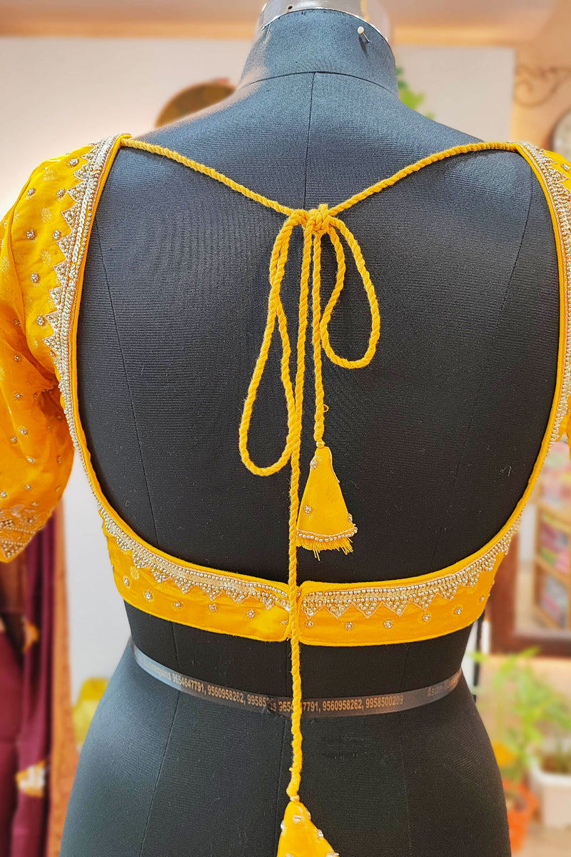 Amber Yellow Shimmer Georgette Saree With Handwork and Designer Padded Handwork Sweetheart Neck Blouse