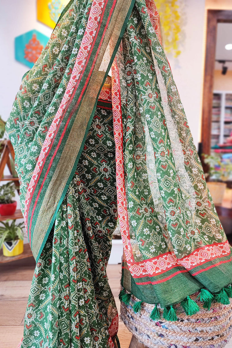 Fern Green Floral Print Linen Saree with Tassel Detailing