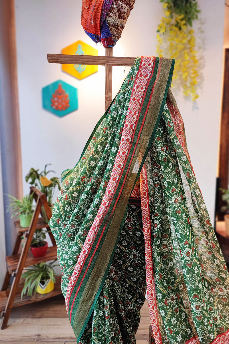 Fern Green Floral Print Linen Saree with Tassel Detailing