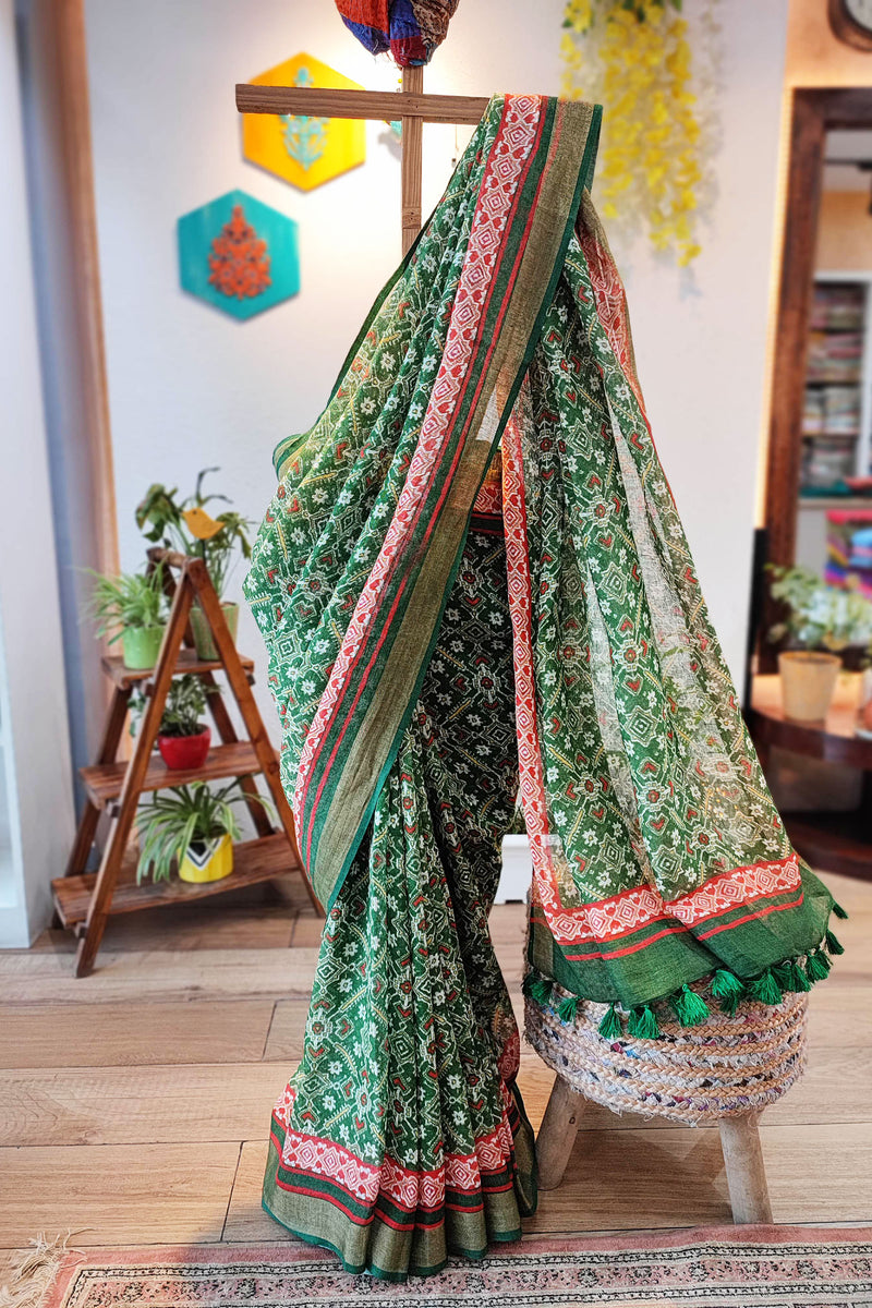 Fern Green Floral Print Linen Saree with Tassel Detailing