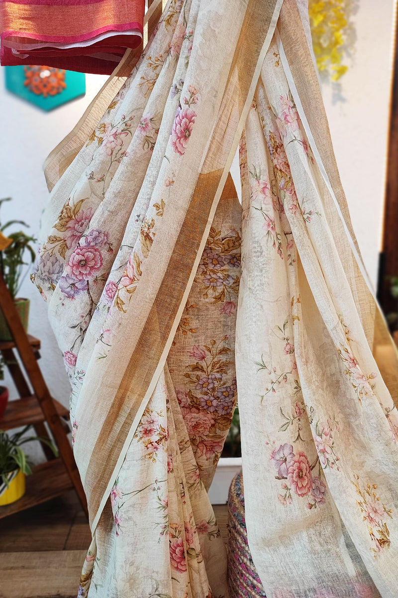 Cream Floral Print Linen Saree with Tassels & Contrasting Red Blouse