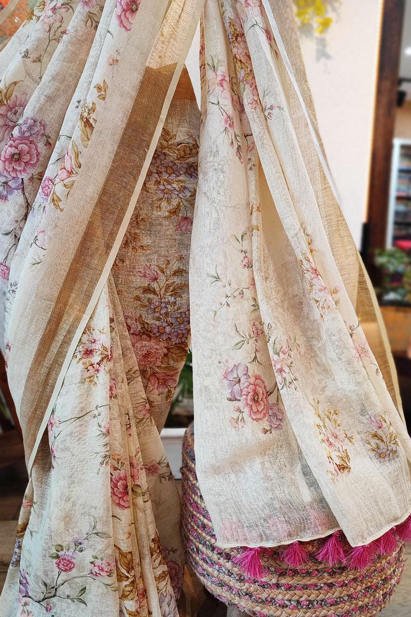 Cream Floral Print Linen Saree with Tassels & Contrasting Red Blouse