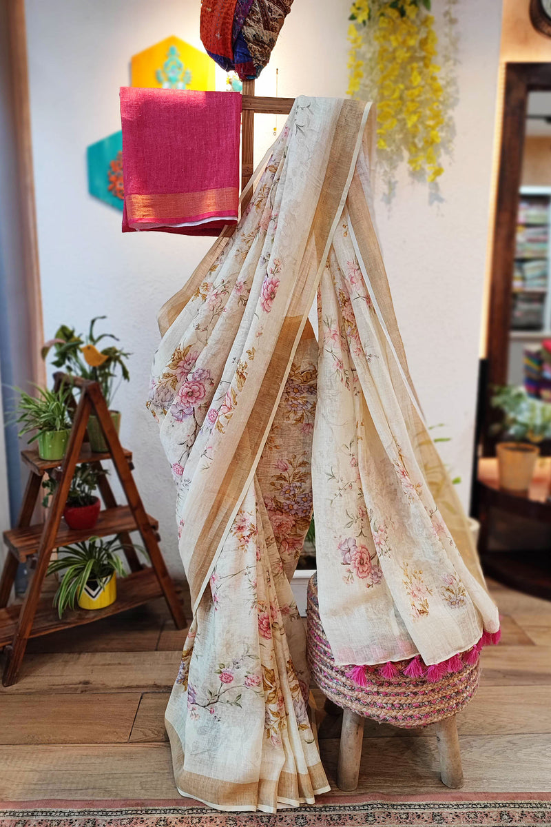 Cream Floral Print Linen Saree with Tassels & Contrasting Red Blouse