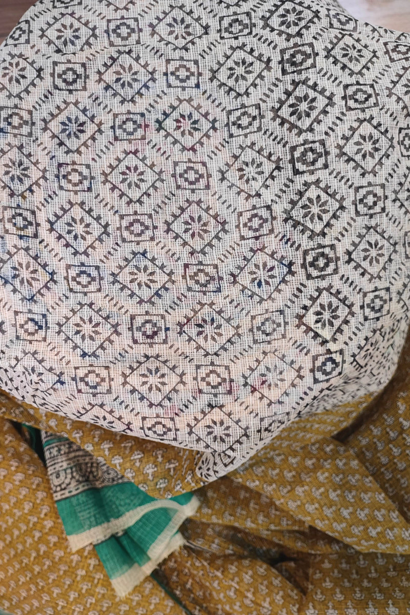 Handblock Printed Kota Doria Saree – Mustard with Green Border & Floral Motifs