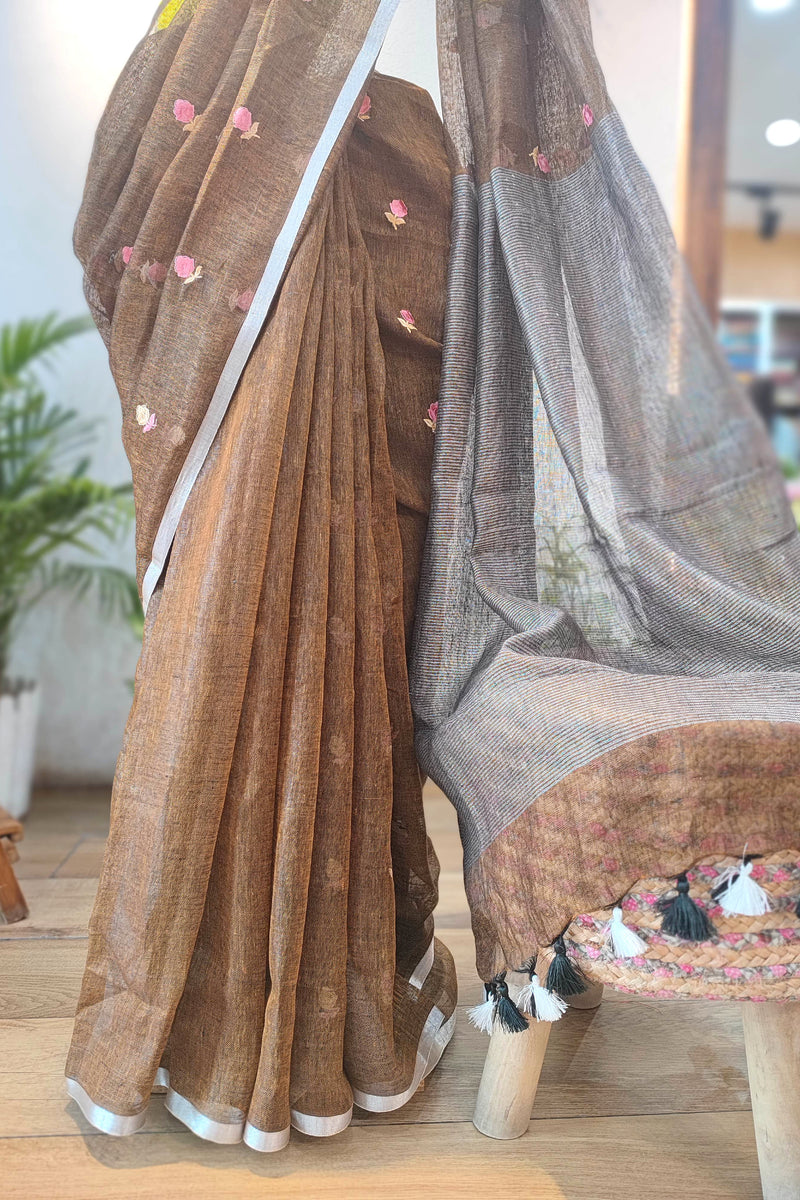Brown Floral Embroidered Pure Linen Saree with Silver Border & Contrast Pallu – Elegant Daily & Office Wear with Black-White Tassels