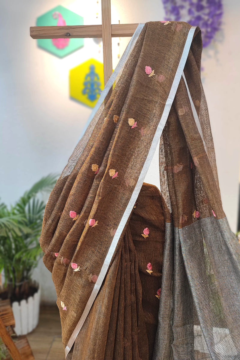 Brown Floral Embroidered Pure Linen Saree with Silver Border & Contrast Pallu – Elegant Daily & Office Wear with Black-White Tassels