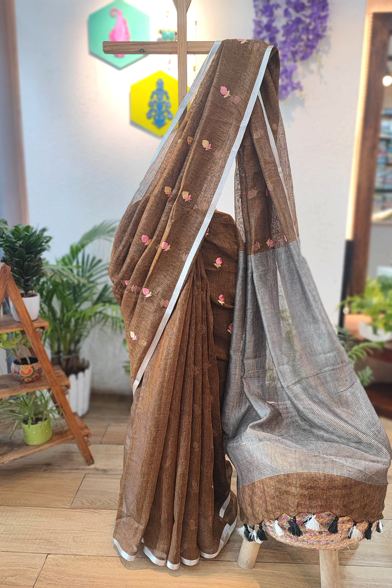 Brown Floral Embroidered Pure Linen Saree with Silver Border & Contrast Pallu – Elegant Daily & Office Wear with Black-White Tassels