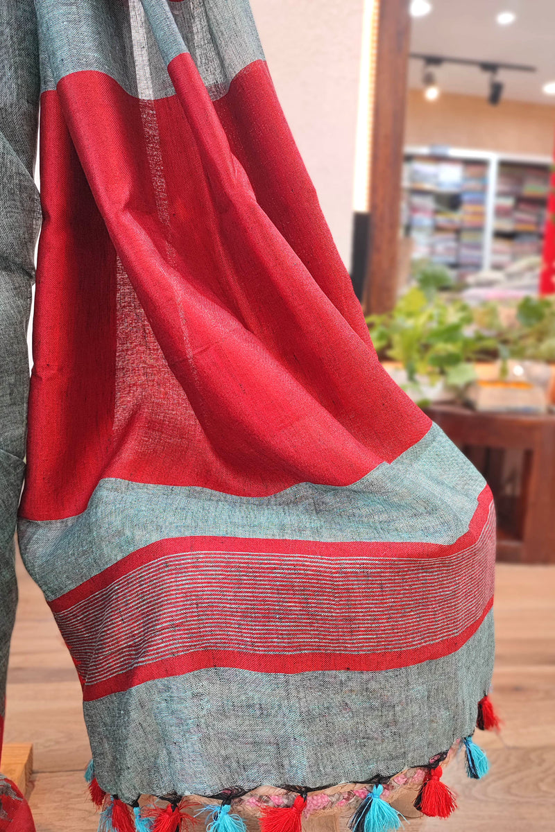 Vibrant Turquoise Green and Red Pure Linen Saree with Woven Border and Multicolor Tassel Pallu – Lightweight Ethnic Drape for Office & Festive Wear