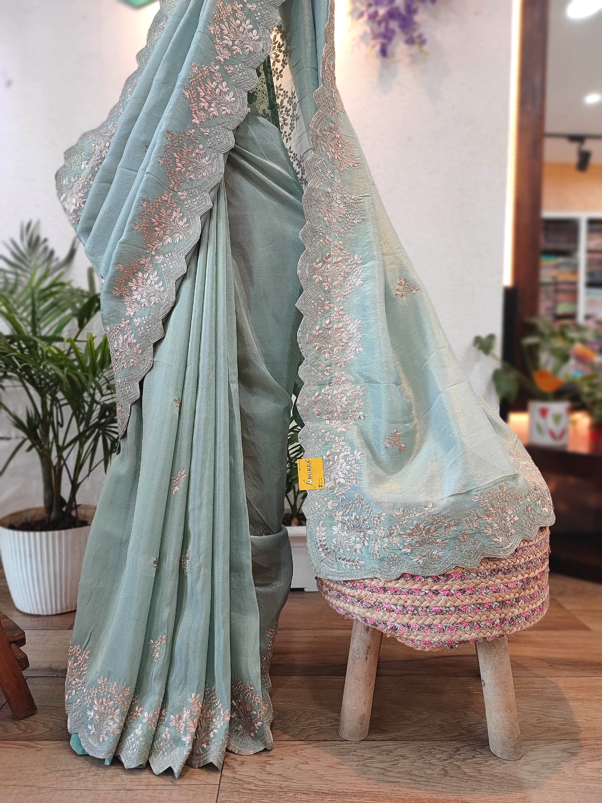 Pastel Green Crepe Silk Saree with Banarasi Weaving & Handwork Motifs