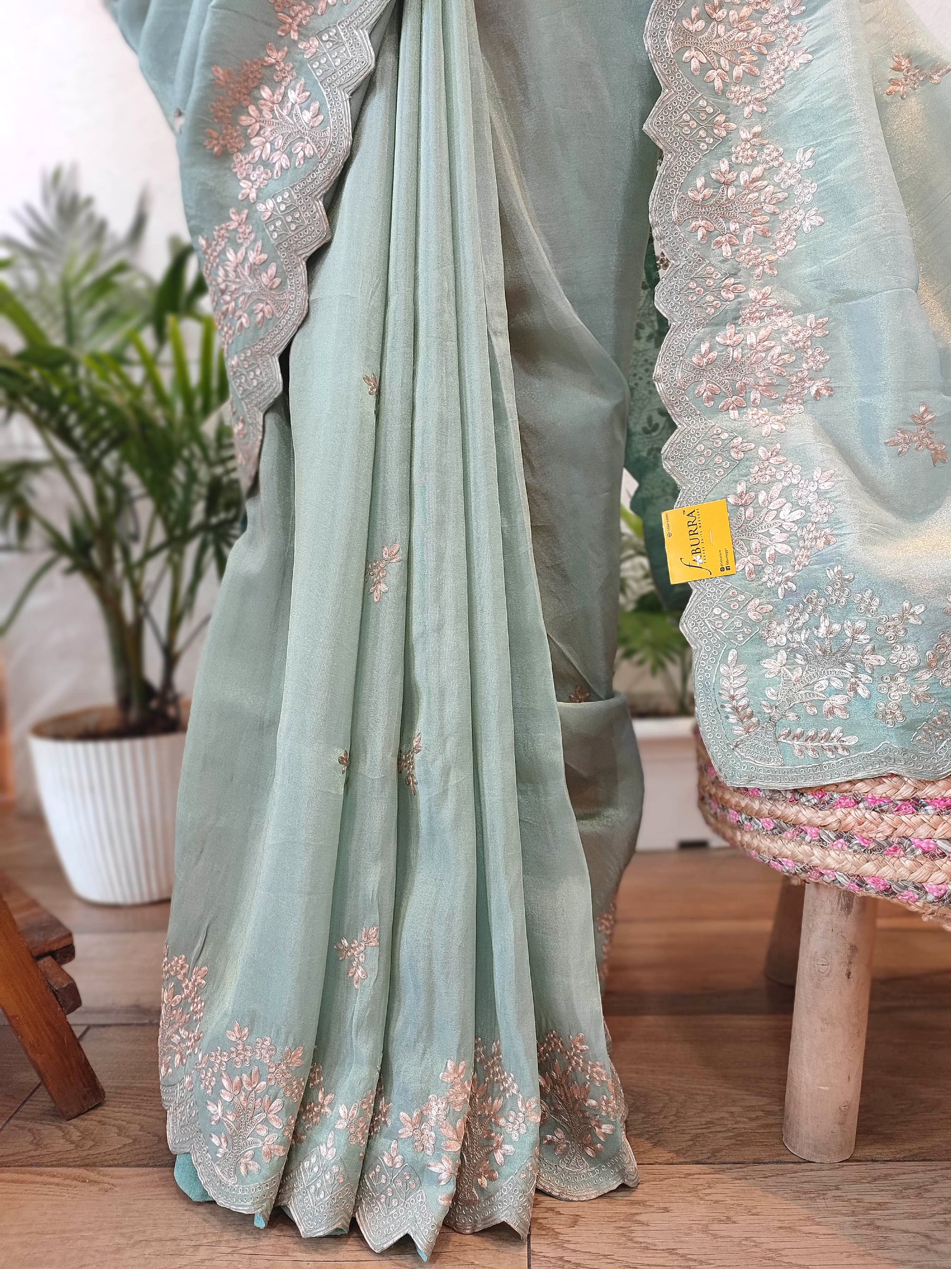 Pastel Green Crepe Silk Saree with Banarasi Weaving & Handwork Motifs