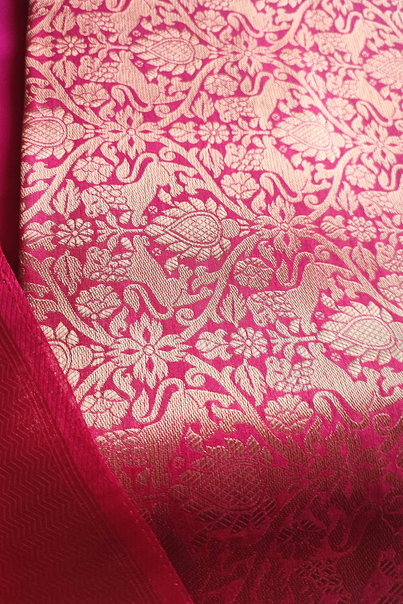 Zari striped dupatta in bright pink Banarasi suit set