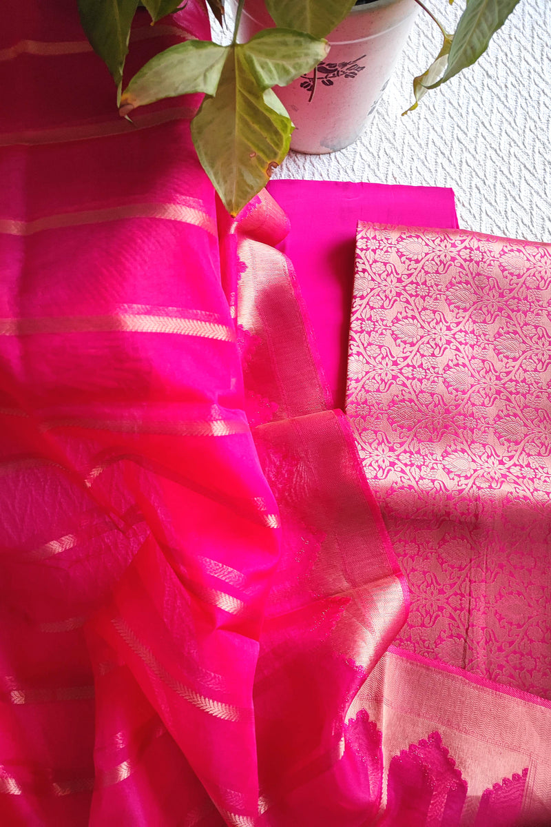 Zari striped dupatta in bright pink Banarasi suit set