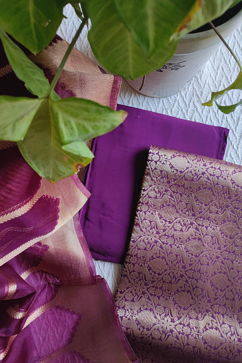 Brocade top fabric in plum with floral zari weaving