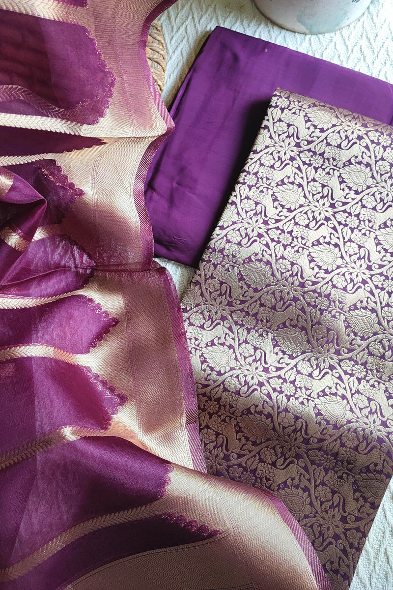 Brocade top fabric in plum with floral zari weaving