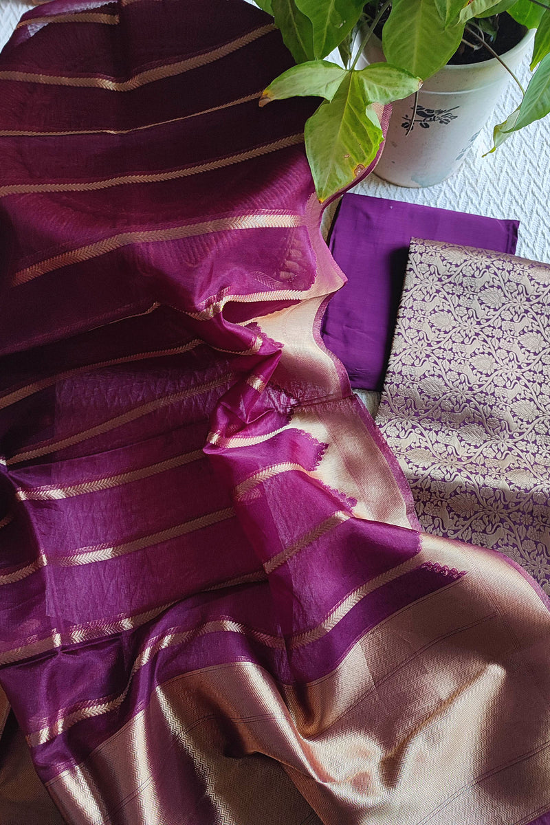 Brocade top fabric in plum with floral zari weaving