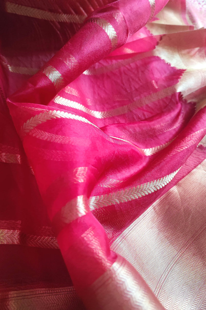 Rani pink Banarasi georgette suit with gold zari weaving