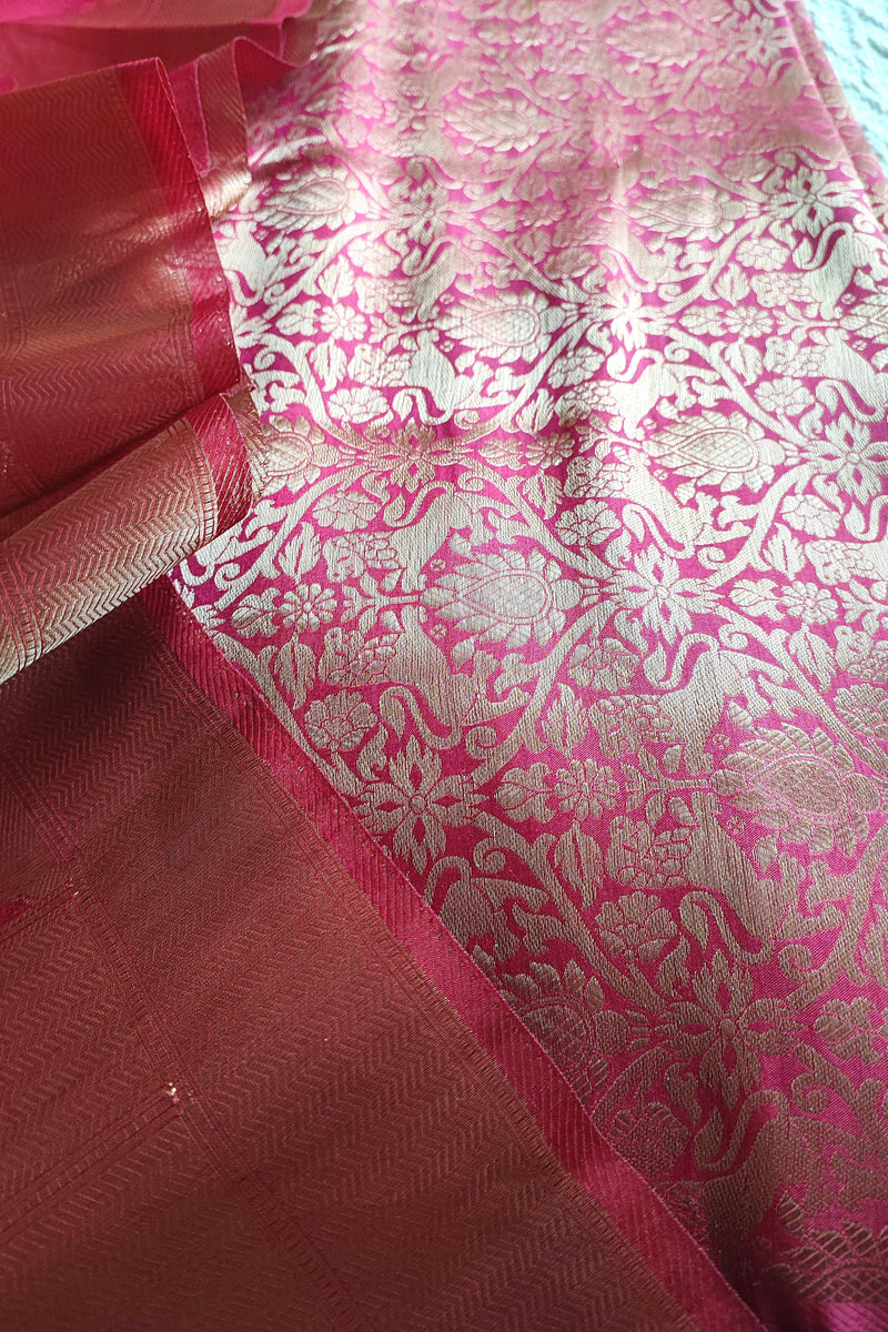 Rani pink Banarasi georgette suit with gold zari weaving