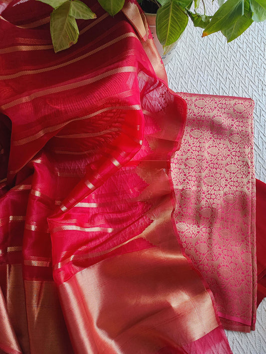 Rani pink Banarasi georgette suit with gold zari weaving