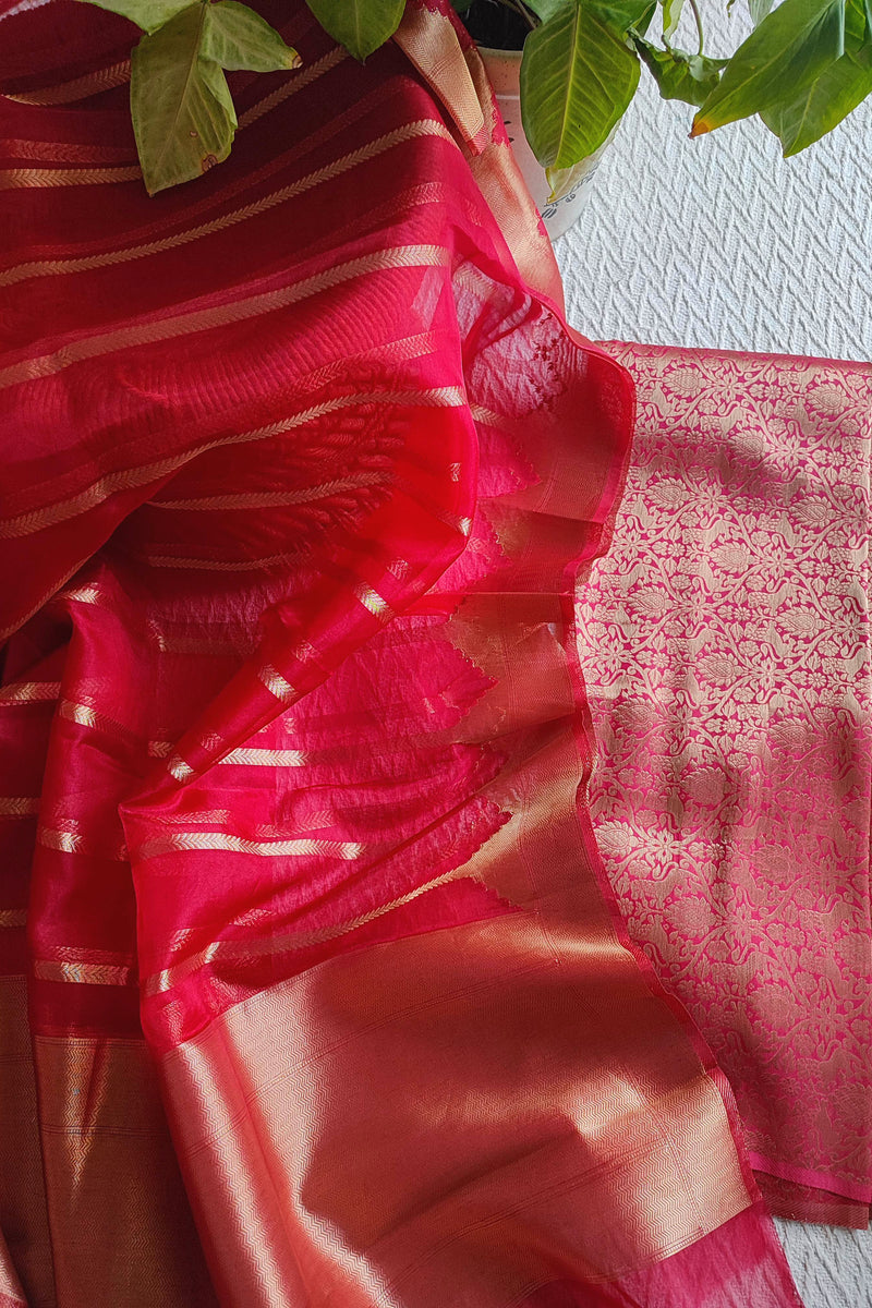 Rani pink Banarasi georgette suit with gold zari weaving