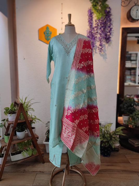 Sky Blue Crape Silk Suit with Rani Printed Dupatta & Embroidered Neckline