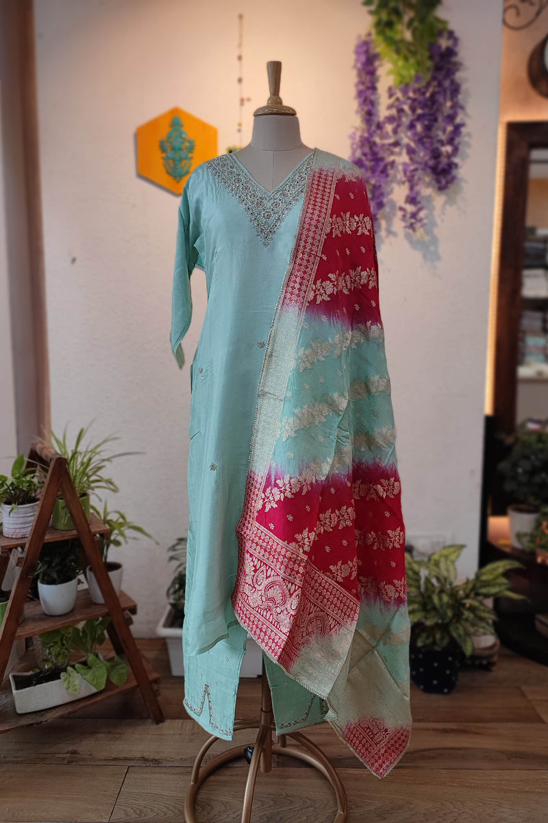 Sky Blue Crape Silk Suit with Rani Printed Dupatta & Embroidered Neckline