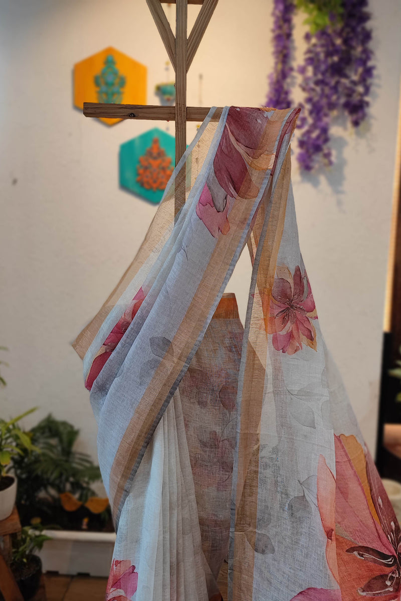 Off White Floral Printed Linen Cotton Saree with Beige Border & Tassel Pallu