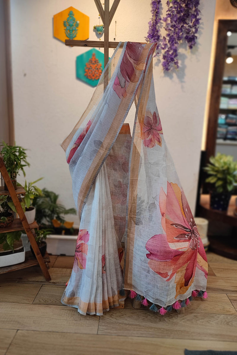 Off White Floral Printed Linen Cotton Saree with Beige Border & Tassel Pallu