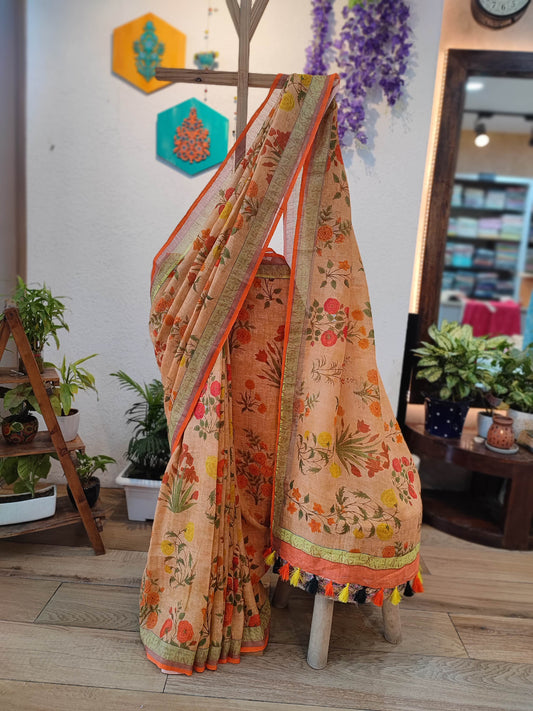 Beige Floral Printed Linen Cotton Saree with Orange Border & Multicolor Tassels