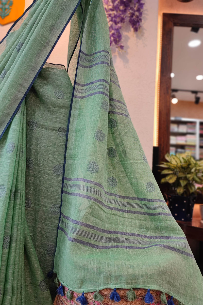 Sea Green Linen Cotton Saree with Woven Buti, Contrast Blue Border & Tassels